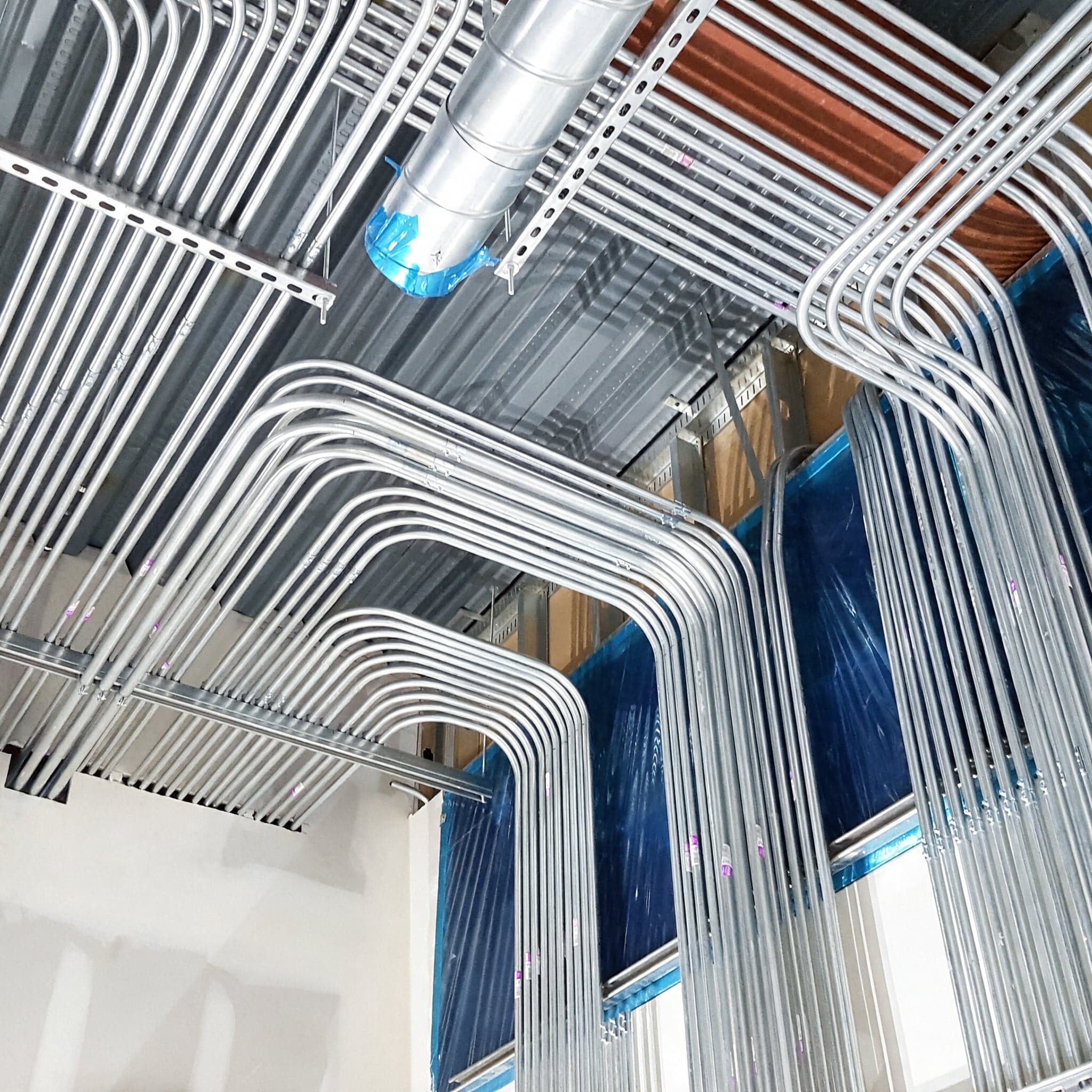 Precision-bent electrical conduit rack